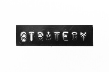 Poster - Black color banner that have embossed letter with word strategy on white paper background