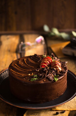 Sticker - Appetizing chocolate strawberry cake, a beautiful still life with a delicious dessert on the table. Sweet delicacy berry pie in a pastry shop.