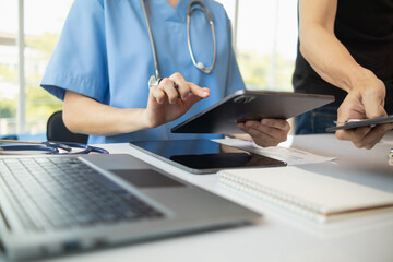 Wall Mural - concept of mobilizing ability of medical team in conference room to diagnose and treat disease correctly. medical team joins meeting and discusses  patient illness in order to treat it correctly