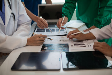 Wall Mural - concept of mobilizing ability of medical team in conference room to diagnose and treat disease correctly. medical team joins meeting and discusses  patient illness in order to treat it correctly