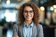 © Oleksandr Blishch - Portrait of a confident business woman in office. AI