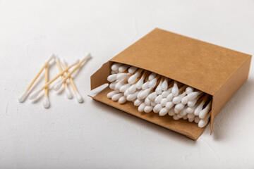 Sticker - White cotton swabs on concrete texture background. Cotton buds. Bamboo cotton buds. Eco friendly. Hygienic cotton swabs for ears. Place for text. Place to copy.