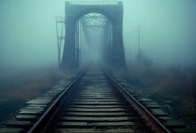 Old Abandoned Railway Tracks Leading To A Tunnel In The Fog. AI Generated