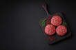© chernikovatv - Fresh raw ground beef burger patty with salt and spices