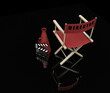3D render of a directors chair and movie items
