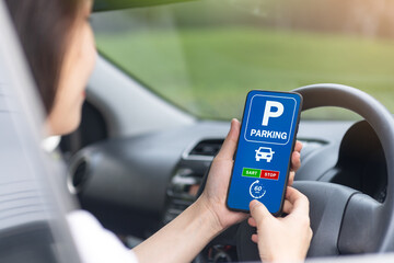
Drive using a mobile app to find parking spaces. In online payment system. 1 hour rental, land traffic concept. Transportation.