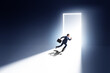 © Elnur - Businessman entering backlit door in escape concept