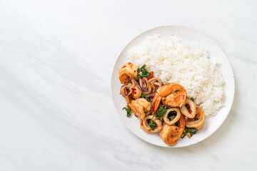 Wall Mural - rice and stir-fried seafood with Thai basil