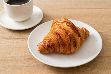 Sticker - fresh croissant on white plate