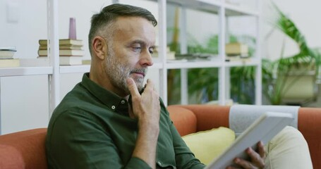 Wall Mural - Tablet, sofa and senior business man in office for planning, reading report and online research. Company, thinking and male worker on couch with digital technology for agenda, strategy and internet