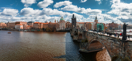 Wall Mural - Scenic spring panoramic aerial view of the Old Town pier architecture and Charles Bridge over Vltava river in Prague, Czech Republic