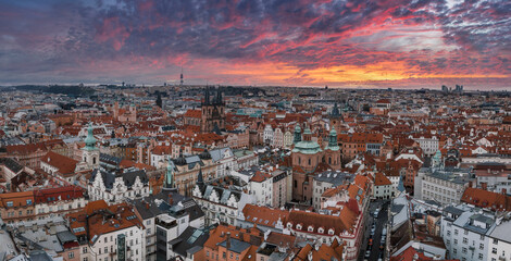 Wall Mural - Panoramic aerial view of old Town square in Prague on a beautiful summer day, Czech Republic. Church of our Lady before Tyn and Prague Astronomical Clock Tower