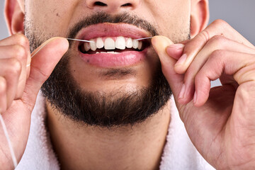 Sticker - Mouth, man and flossing teeth for dental health in studio isolated on a white background. Closeup, floss and male model cleaning tooth for oral wellness, hygiene and healthy product for fresh breath.