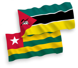 Flags of Togolese Republic and Republic of Mozambique on a white background