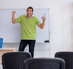 Wall Mural - Young male student in business presentation concept