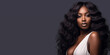 © TimeaPeter - Attractive black woman isolated on dark  solid background