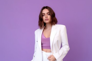 Wall Mural - Portrait of an elegant white model wearing a lavender pink blazer, isolated on plain colorful background. Generative AI illustration.