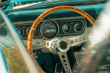 Steering Wheel In A Classic Car, Old Automobile, Vintage Vehicle Interior, Wooden Traditional Cars Dashboard Dials, Speed Clocks Speedo