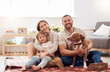 © D Lahoud/peopleimages.com - Mom, dad and portrait of kid with dog in living room for quality time, love and care together at home. Mother, father and happy family with child, pet pitbull and relax for happiness on carpet floor