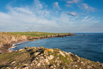 Canvas Print - Beauitful sunrise and sunset landscape image of Kynance Cove in Cornwall England with colourful sky