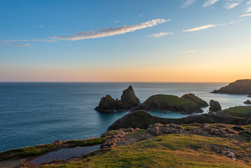 Wall Mural - Beauitful sunrise and sunset landscape image of Kynance Cove in Cornwall England with colourful sky