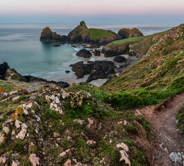 Wall Mural - Beauitful sunrise and sunset landscape image of Kynance Cove in Cornwall England with colourful sky
