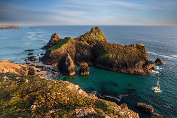 Wall Mural - Beauitful sunrise and sunset landscape image of Kynance Cove in Cornwall England with colourful sky