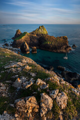 Wall Mural - Beauitful sunrise and sunset landscape image of Kynance Cove in Cornwall England with colourful sky