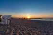 Romantischer Sonnenuntergang am Strand in Zingst an der Ostsee.