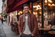 Medium shot portrait photography of a grinning man in his 30s that is wearing a chic cardigan against a parisian or european cafe background . Generative AI