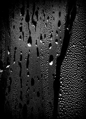 water drops condensed texture black background