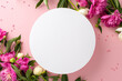 Beauty of peonies concept. High angle view photo of empty circle surrounded by bright pink and white peony flowers and buds with small confetti hearts on isolated pastel pink background with copyspace