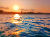Fototapeta Konie - Sea wave splash, sunset blurred bokeh background, ocean water surf ripple texture, sunrise soft focus, tropical island beach dawn, sundown orange sun shine reflection, summer holiday, vacation, travel