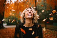 Young Beautiful Woman Laughing Amidst Falling Leaves. Generative AI