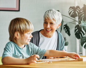 Wall Mural - grandchild family child grandparent grandmother game playing boy stick pick up board board game grandson creativity education