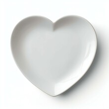 Empty Plate In The Shape Of A Heart On A White Background In The Center Of The Frame. Isolated Background. Created With Generative AI Technology. 