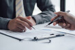 © Kritdanai - Business people talking about business strategy Collaborate teamwork during discussions on financial and marketing documents, financial data analysis meetings, and in-office charts.