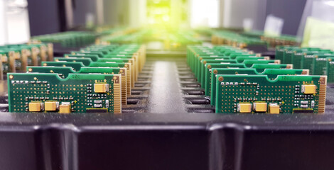 Electronics Manufacturing Services, Assembly Of Circuit Board arrangement, close-up of the raw of PCBA in tray.