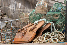 A Pile Of Lobster And Crab Cages Stacked On A Jetty