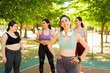 © AntonioDiaz - Cheerful beautiful woman exercising or running with friends