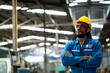 © KANGWANS - confidence african american industrial engineer in factory.