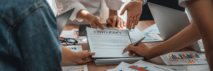 Poster - Panorama shot hand signing signature on legal contract, business report and BI Fintech paper on table. Seal business agreement deal with signature. Investment loan for startup company. Scrutinize