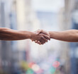 © Irshaad Majal/peopleimages.com - Closeup, handshake and people meeting outdoor for introduction, agreement and support of deal, partnership or welcome. Thank you, greeting and shaking hands for hello, networking and trust of success