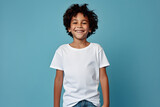 Fototapeta Natura - Male child, boy wearing bella canvas white shirt mockup, at blue background. Design tshirt template, print presentation mock-up. AI generated.