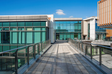 Canvas Print - Modern urban business building on a sunny day