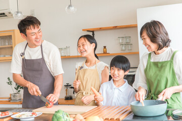 Sticker - 家のキッチンで子供と一緒に料理・クッキング・お手伝いする子供と夫婦・親子・家族
