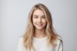 © Adriana - Headshot of a beautiful blond smiling young woman looking at the camera on gray background. Generative AI