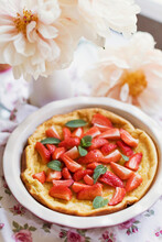 Dutch Baby Pancake With Strawberries And Mint