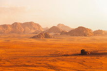 Scenic View Of Wadi Rum Desert At Sunset