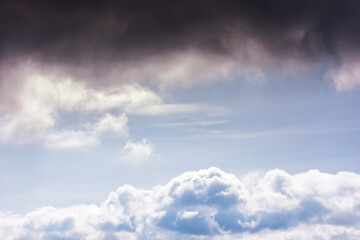 Wall Mural - sunny weather forecast background. blue sky with white clouds above horizon in morning light